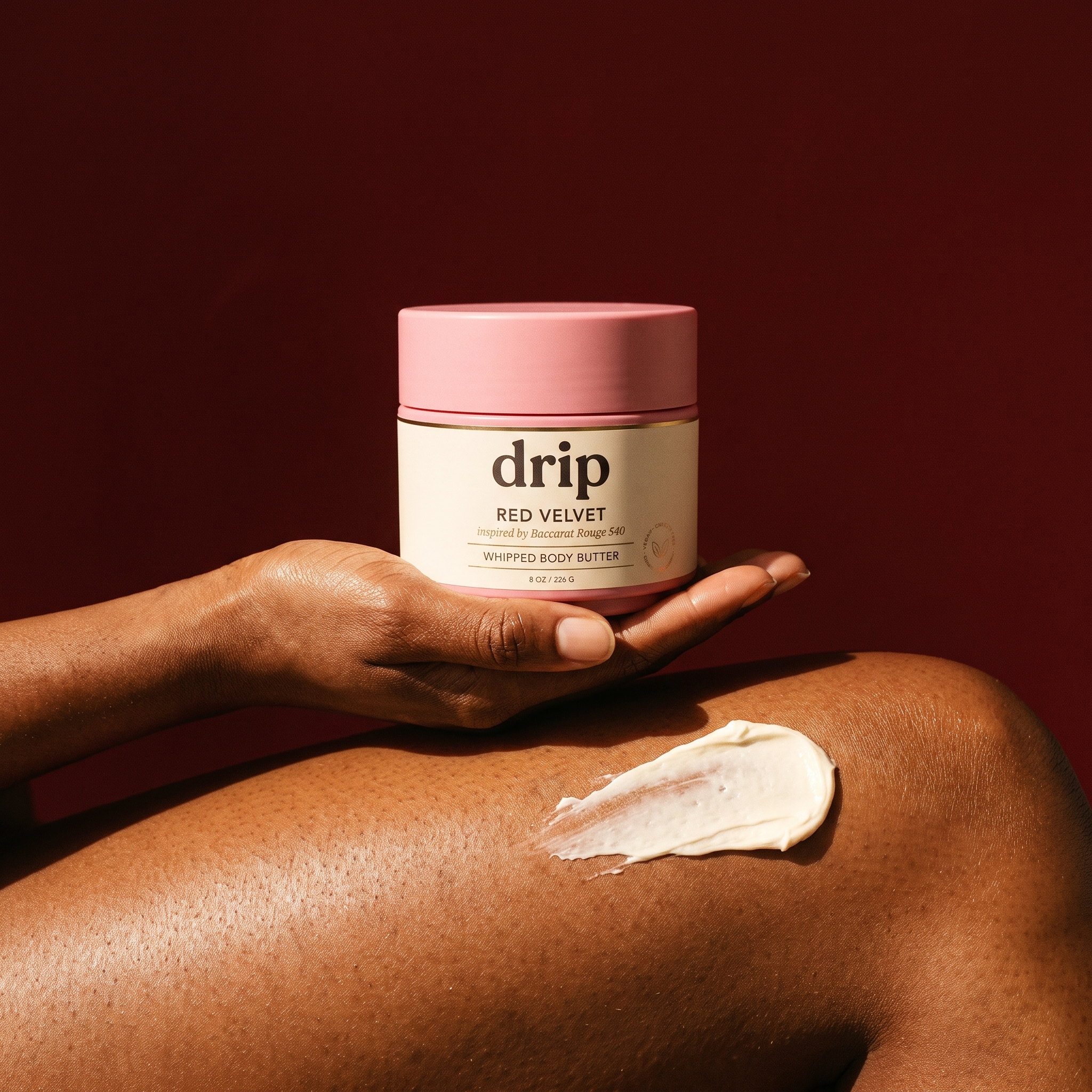 Red Velvet whipped body butter in hand